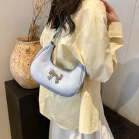 Femmes Moyen Faux Cuir Couleur Unie Noeud D'Arc Style Classique Vêtement De Rue Fermeture Éclair Sac Sous Les Bras sku image 2