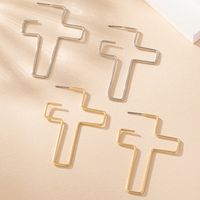 1 Pair Exaggerated Simple Style Cross Hollow Out Iron Ear Studs main image 1