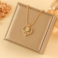 201 Stainless Steel Brass 18K Gold Plated Simple Style Classic Style Hollow Out Inlay Heart Shape Flower Zircon Pendant Necklace main image 4