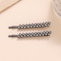 Mujeres Elegante Brillante Color Sólido Metal Embutido Diamantes De Imitación Pinza Para El Cabello sku image 4