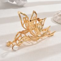 Frau IG-Stil Einfacher Stil Schmetterling Metall Aushöhlen Inlay Perle Haarkrallen sku image 1