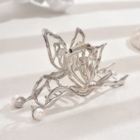 Frau IG-Stil Einfacher Stil Schmetterling Metall Aushöhlen Inlay Perle Haarkrallen sku image 2
