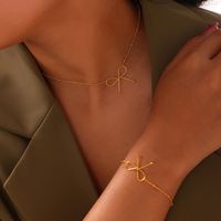 Titan Stahl 18 Karat Vergoldet Lässig Einfacher Stil Pendeln Überzug Bogenknoten Armbänder Halskette main image 4