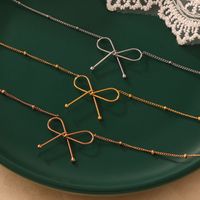 Titan Stahl 18 Karat Vergoldet Lässig Einfacher Stil Pendeln Überzug Bogenknoten Armbänder Halskette main image 5