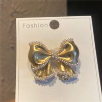 Sweet Simple Style Bow Knot Metal Hollow Out Inlay Pearl Women's Brooches sku image 4