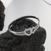 Simple Style Shiny Heart Shape Butterfly Alloy Hollow Out Inlay Zircon Women's Bangle main image 4