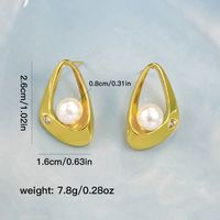 1 Pair Simple Style Shiny Triangle Hollow Out Inlay Copper Artificial Pearls Zircon 18K Gold Plated Ear Studs main image 2