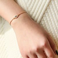 Copper K Gold Plated Casual Classic Style Hollow Out Inlay Eye Zircon Bracelets main image 5