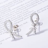 1 Pair Simple Style Classic Style Bow Knot Inlay Copper Rhinestones Ear Studs main image 1