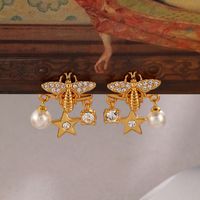 1 Par Estilo IG Retro Estrella Abeja Embutido Cobre Perla Circón Pendientes De Gota sku image 1