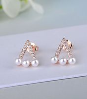 1 Pair IG Style Simple Style Triangle Hollow Out Inlay Copper Artificial Pearls Zircon Ear Studs main image 1