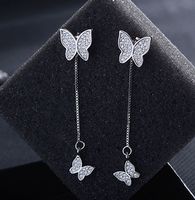 1 Pair Simple Style Shiny Butterfly Chain Inlay Copper Zircon Drop Earrings main image 1