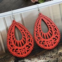 1 Pair Casual Ethnic Style Water Droplets Stoving Varnish Hollow Out Wood Drop Earrings main image 1