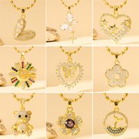 201 Stainless Steel Brass 18K Gold Plated Sweet Simple Style Classic Style Plating Inlay Heart Shape Flower Butterfly Zircon Pendant Necklace main image 1