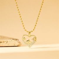 201 Stainless Steel Brass 18K Gold Plated Sweet Simple Style Classic Style Plating Inlay Heart Shape Flower Butterfly Zircon Pendant Necklace main image 6