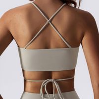 Simple Style Solid Color Nylon Halter Neck Active Tops Halter Crisscross Tank Flared Pants main image 3