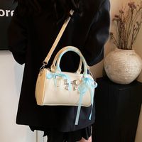 Women's Medium Pu Leather Solid Color Bow Knot Streetwear Cylindrical Zipper Crossbody Bag main image 2