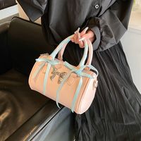 Women's Medium Pu Leather Solid Color Bow Knot Streetwear Cylindrical Zipper Crossbody Bag main image 3