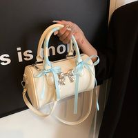 Women's Medium Pu Leather Solid Color Bow Knot Streetwear Cylindrical Zipper Crossbody Bag main image 1