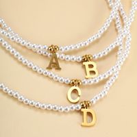 Wholesale Jewelry Elegant Simple Style Letter Artificial Pearl Alloy Copper Beaded Pendant Necklace main image 4