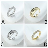 Style Simple Brillant Lettre Alliage Asymétrique Incruster Zircon Femmes Anneaux main image 2