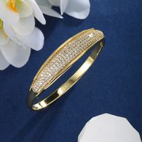 Exaggerated XUPING Geometric Copper Inlay Artificial Gemstones 18K Gold Plated Women's Bangle main image 9