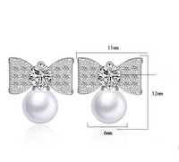 1 Pair Elegant Modern Style Commute Bow Knot Inlay Copper Artificial Pearls Zircon Drop Earrings main image 2