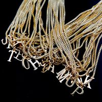 Cobre Chapados en oro de 18k Estilo Simple Color Sólido Enchapado Letra Collar Colgante main image 2