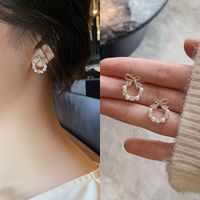 Elegant Geometric Bow Knot Imitation Pearl Alloy Inlay Rhinestones Women's Earrings 1 Pair sku image 3