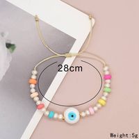 Simple Style Classic Style Devil's Eye Freshwater Pearl Glass Soft Clay Beaded Braid Drawstring Bracelets main image 9