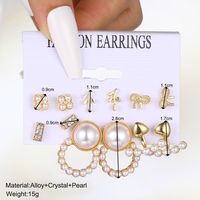 1 Set Casual Retro Heart Shape Bow Knot Inlay Alloy Artificial Pearls Earrings main image 2