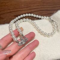 Elegant Luxurious Geometric Imitation Pearl Alloy Plating Inlay Rhinestones Silver Plated Women's Necklace main image 2