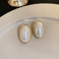 Elegant Einfacher Stil Herzform Bogenknoten Legierung Inlay Künstliche Perlen Strasssteine Frau Ohrringe sku image 12