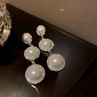 Elegant Einfacher Stil Herzform Bogenknoten Legierung Inlay Künstliche Perlen Strasssteine Frau Ohrringe sku image 10