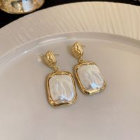Elegant Einfacher Stil Herzform Bogenknoten Legierung Inlay Künstliche Perlen Strasssteine Frau Ohrringe sku image 7