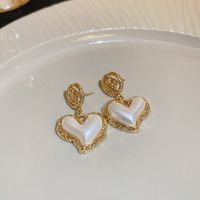 Elegant Einfacher Stil Herzform Bogenknoten Legierung Inlay Künstliche Perlen Strasssteine Frau Ohrringe sku image 8