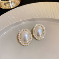 Elegant Einfacher Stil Herzform Bogenknoten Legierung Inlay Künstliche Perlen Strasssteine Frau Ohrringe sku image 4
