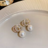 Elegant Einfacher Stil Herzform Bogenknoten Legierung Inlay Künstliche Perlen Strasssteine Frau Ohrringe sku image 13