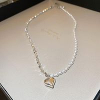 Glam Retro Heart Shape Bow Knot Imitation Pearl Beaded Plating Inlay Rhinestones Women's Layered Necklaces sku image 10