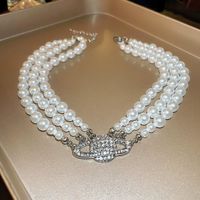 Glam Retro Heart Shape Bow Knot Imitation Pearl Beaded Plating Inlay Rhinestones Women's Layered Necklaces sku image 19