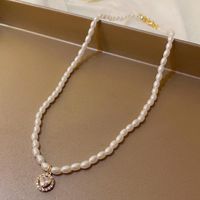 Glam Retro Heart Shape Bow Knot Imitation Pearl Beaded Plating Inlay Rhinestones Women's Layered Necklaces sku image 14