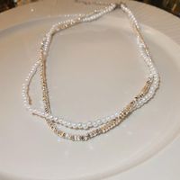 Glam Retro Heart Shape Bow Knot Imitation Pearl Beaded Plating Inlay Rhinestones Women's Layered Necklaces sku image 29