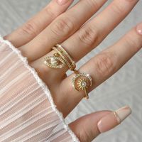 Casual Modern Style Sun Moon Eye Copper Asymmetrical Plating Inlay Rhinestones 18k Gold Plated Open Rings main image 1