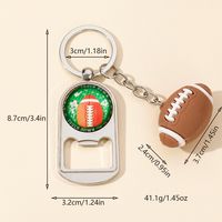 Casual Nordic Style Sports Ball Pvc Alloy Glass Printing Plating Silver Plated Super Bowl Bag Pendant Can Openers Keychain main image 2
