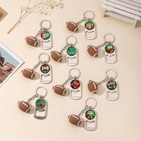Casual Nordic Style Sports Ball Pvc Alloy Glass Printing Plating Silver Plated Super Bowl Bag Pendant Can Openers Keychain main image 1