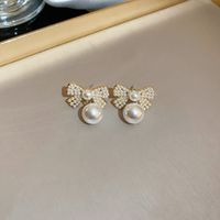 1 Pair Elegant Letter Bow Knot Inlay Metal Copper Pearl Zircon Drop Earrings sku image 4