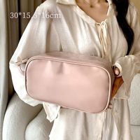 Women's Pu Leather Solid Color Classic Style Oval Zipper Cosmetic Bag Travel Bag Wash Bag sku image 2
