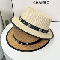 Women's Simple Style Flower Flat Eaves Straw Hat main image 4