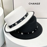 Women's Simple Style Flower Flat Eaves Straw Hat main image 3