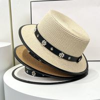 Women's Simple Style Flower Flat Eaves Straw Hat main image 5
